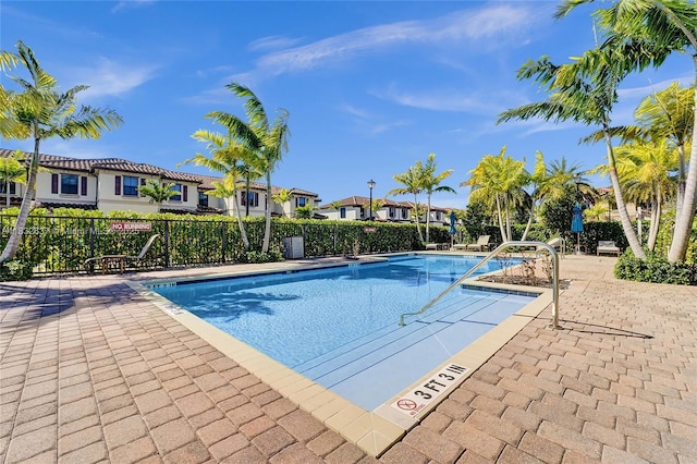5013 Vulcan Way, Davie, FL 33314 - community pool with a residential view and a patio area