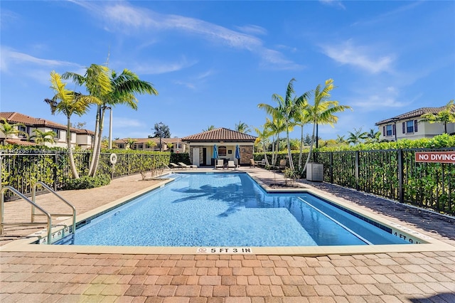 5013 Vulcan Way, Davie, FL 33314 - community pool with a patio area