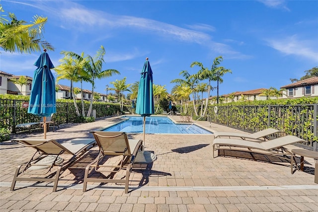 5013 Vulcan Way, Davie, FL 33314 - community pool with a patio area
