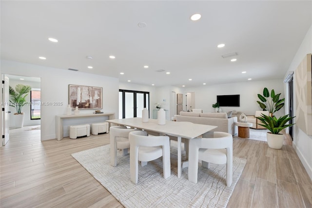 10704 SW 133rd Ter, Miami, FL 33176 - dining area featuring recessed lighting, light wood-type flooring, and french doors