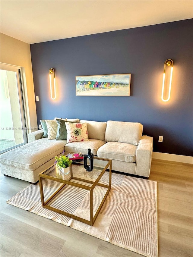 300 Bayview Dr Unit 1801, Sunny Isles Beach, FL 33160 - living room featuring wood finished floors and baseboards