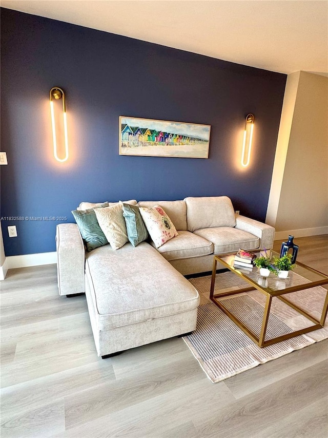 300 Bayview Dr Unit 1801, Sunny Isles Beach, FL 33160 - living room with baseboards and wood finished floors