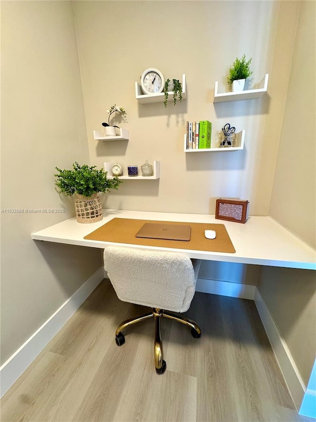 300 Bayview Dr Unit 1801, Sunny Isles Beach, FL 33160 - home office with built in study area and wood finished floors