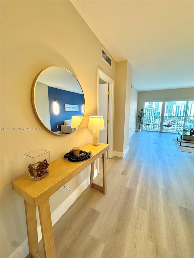 300 Bayview Dr Unit 1801, Sunny Isles Beach, FL 33160 - hallway featuring wood finished floors