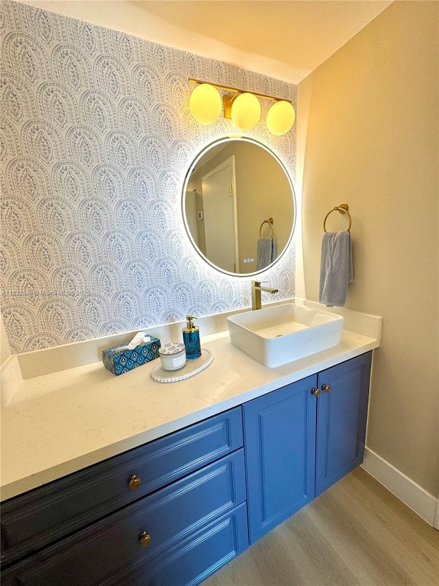 300 Bayview Dr Unit 1801, Sunny Isles Beach, FL 33160 - bathroom with wood finished floors and vanity
