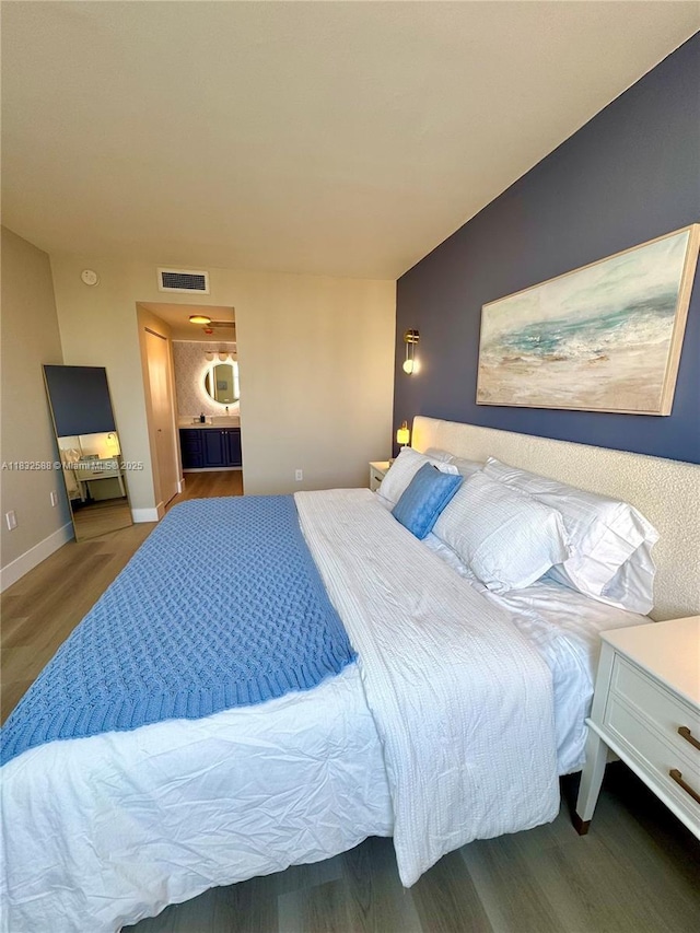 300 Bayview Dr Unit 1801, Sunny Isles Beach, FL 33160 - bedroom with wood finished floors and baseboards