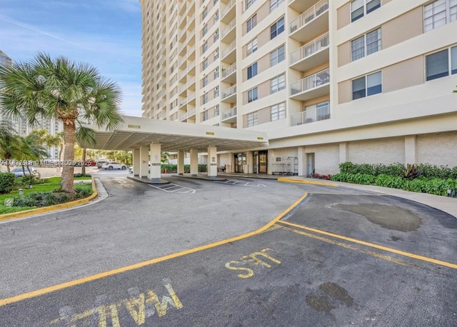 300 Bayview Dr Unit 1801, Sunny Isles Beach, FL 33160 - view of apartment building / complex featuring uncovered parking
