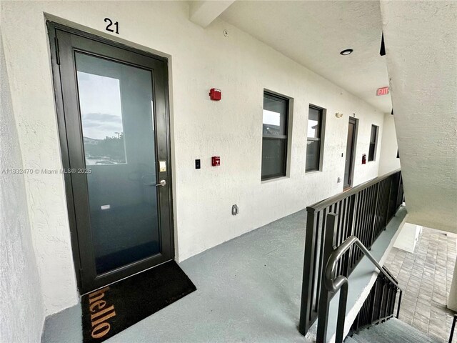 8031 NW 104th Ave Unit 21, Doral, FL 33178 - view of exterior entry with stucco siding