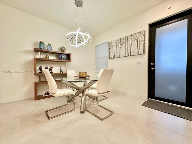 8031 NW 104th Ave Unit 21, Doral, FL 33178 - tiled dining room featuring a chandelier
