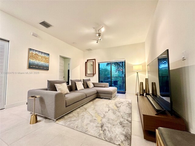 8031 NW 104th Ave Unit 21, Doral, FL 33178 - living area featuring light tile patterned flooring