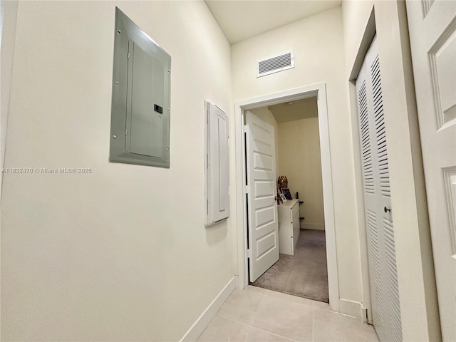 8031 NW 104th Ave Unit 21, Doral, FL 33178 - hall featuring electric panel and light tile patterned floors