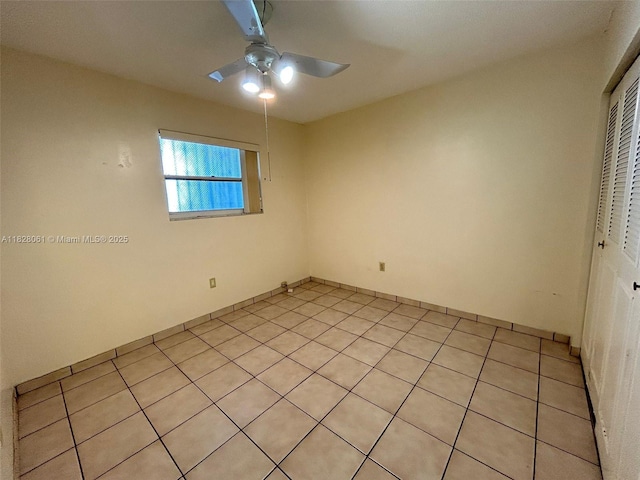 3181 SW 13th St Unit 401, Miami, FL 33145 - spare room with ceiling fan and light tile patterned floors