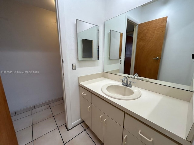 3181 SW 13th St Unit 401, Miami, FL 33145 - bathroom with vanity and tile patterned flooring
