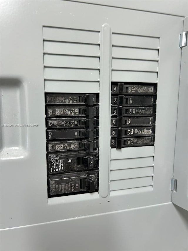 3181 SW 13th St Unit 401, Miami, FL 33145 - utility room featuring electric panel