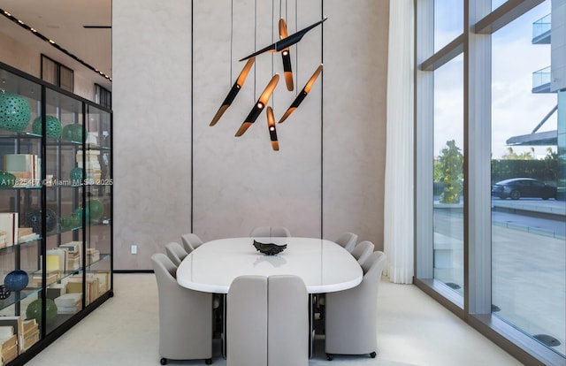 10201 Collins Ave Unit 1802, Bal Harbour, FL 33154 - dining area with plenty of natural light and a wall of windows