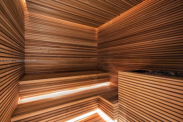 10201 Collins Ave Unit 1802, Bal Harbour, FL 33154 - relaxing sauna / steam room featuring wood walls