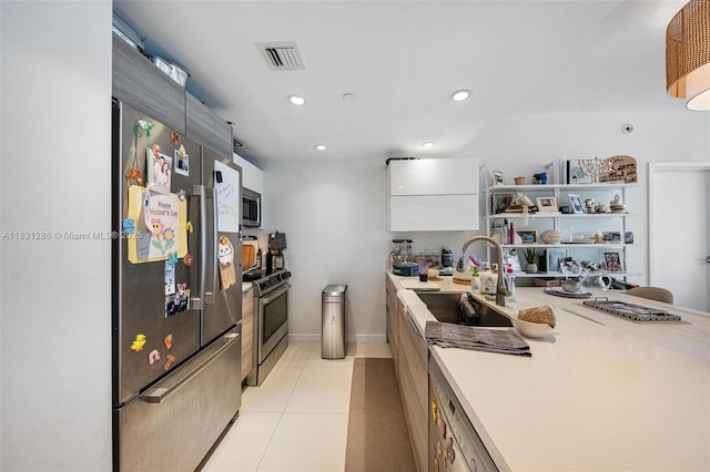 9940 W Bay Harbor Dr Unit 4B-S, Bay Harbor Islands, FL 33154 - kitchen featuring appliances with stainless steel finishes, recessed lighting, modern cabinets, light countertops, and light tile patterned flooring