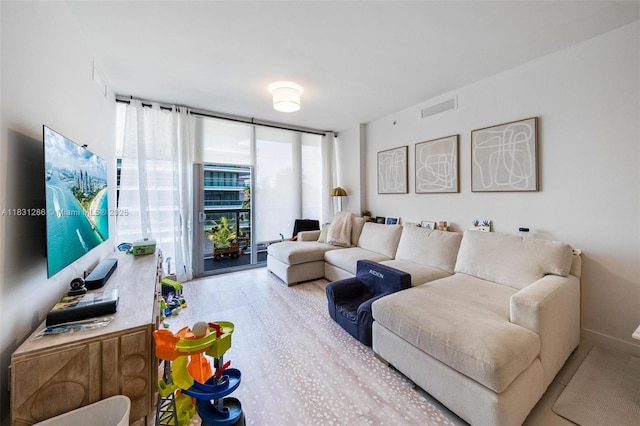 9940 W Bay Harbor Dr Unit 4B-S, Bay Harbor Islands, FL 33154 - living room featuring floor to ceiling windows