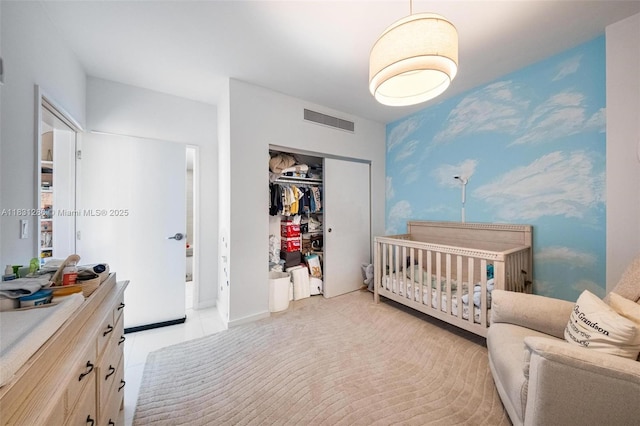 9940 W Bay Harbor Dr Unit 4B-S, Bay Harbor Islands, FL 33154 - bedroom featuring a closet and a crib