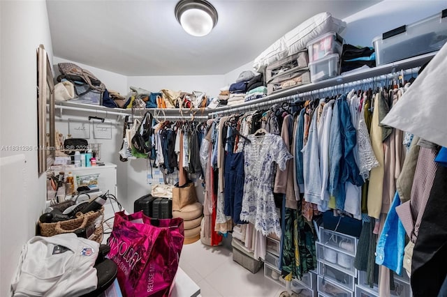 9940 W Bay Harbor Dr Unit 4B-S, Bay Harbor Islands, FL 33154 - walk in closet featuring tile patterned floors