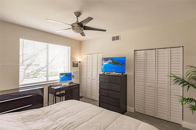 23 Simonton Cir, Weston, FL 33326 - bedroom with a ceiling fan and wood finished floors
