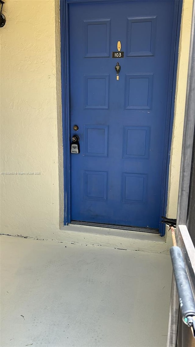 189 Lakeview Dr Unit 103, Weston, FL 33326 - property entrance with stucco siding