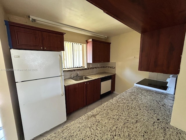 189 Lakeview Dr Unit 103, Weston, FL 33326 - kitchen with white appliances, light tile patterned floors, tasteful backsplash, and light countertops