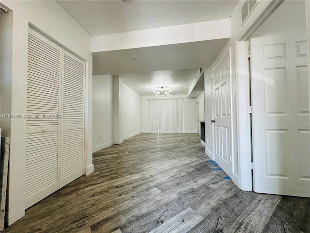 1962 Freeport Ln Unit 1962, Riviera Beach, FL 33404 - additional living space with wood finished floors and a chandelier