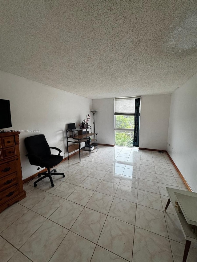 16851 NE 23rd Ave Unit A516, North Miami Beach, FL 33160 - office area with a textured ceiling