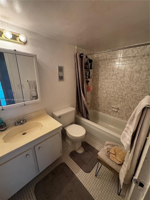 16851 NE 23rd Ave Unit A516, North Miami Beach, FL 33160 - bathroom with vanity, shower / bath combo, and tile patterned floors