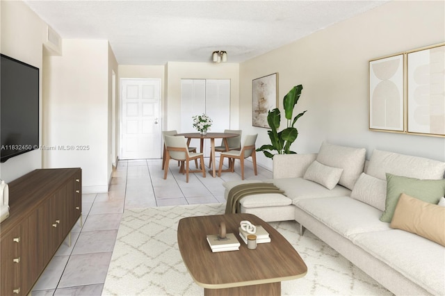1755 W 60th St Unit D206, Hialeah, FL 33012 - living area featuring light tile patterned floors and baseboards