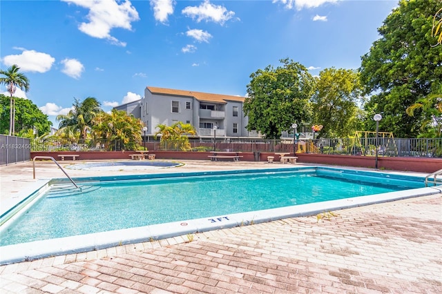 1755 W 60th St Unit D206, Hialeah, FL 33012 - community pool with a patio