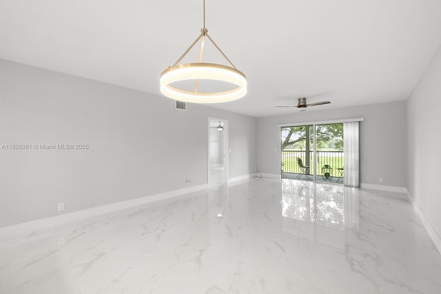 12500 SW 6th St Unit 206N, Pembroke Pines, FL 33027 - unfurnished room featuring marble finish flooring and ceiling fan