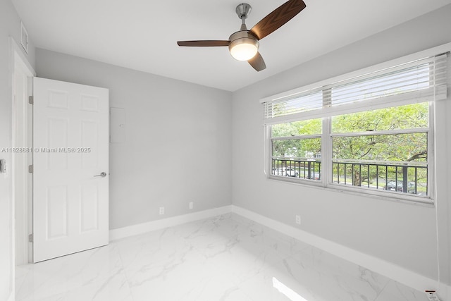 12500 SW 6th St Unit 206N, Pembroke Pines, FL 33027 - spare room featuring marble finish flooring and ceiling fan