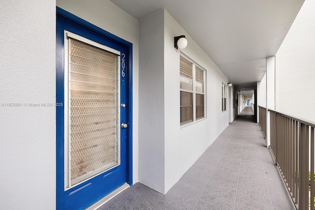 12500 SW 6th St Unit 206N, Pembroke Pines, FL 33027 - doorway to property with stucco siding