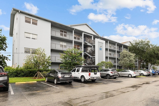12500 SW 6th St Unit 206N, Pembroke Pines, FL 33027 - view of apartment building / complex featuring uncovered parking
