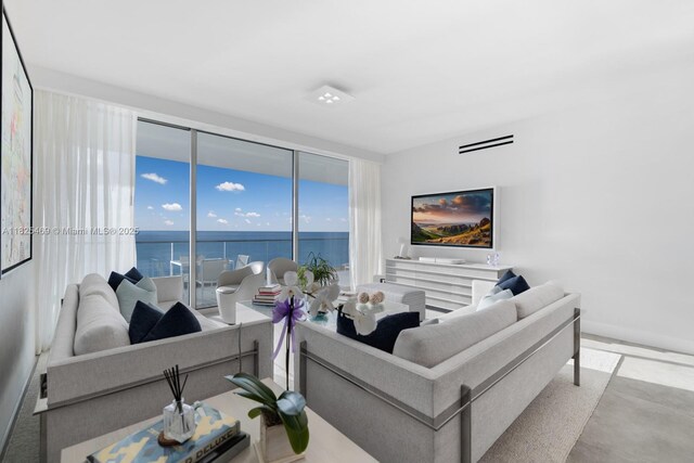 10203 Collins Ave Unit 1003, Bal Harbour, FL 33154 - living area with baseboards