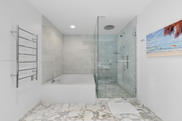 10203 Collins Ave Unit 1003, Bal Harbour, FL 33154 - full bath with marble finish flooring, a garden tub, a shower stall, a towel warmer, and recessed lighting