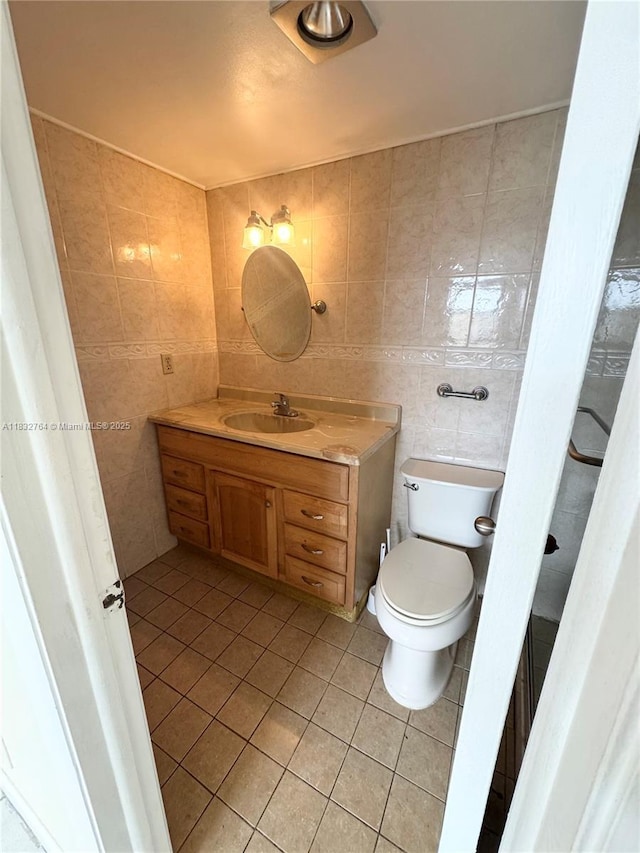 401 SE 3rd St Unit 405, Dania Beach, FL 33004 - bathroom featuring tile walls, tile patterned flooring, and vanity