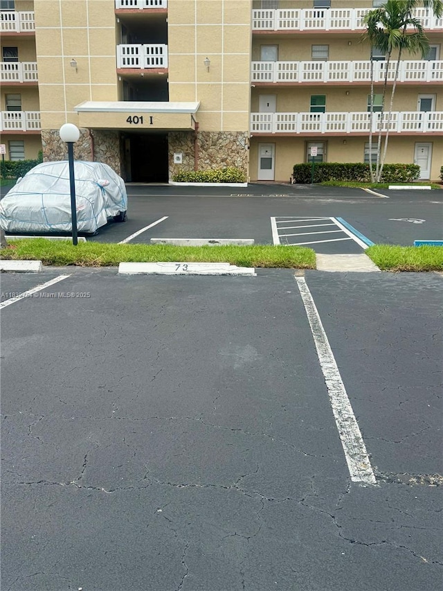 401 SE 3rd St Unit 405, Dania Beach, FL 33004 - view of uncovered parking lot
