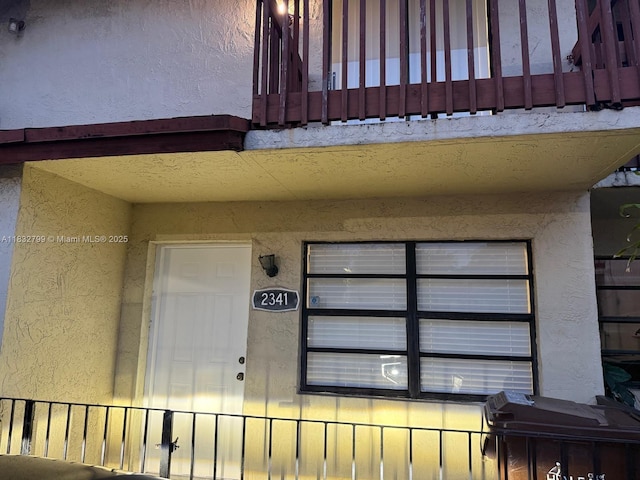 2341 W 66th Pl Unit 103, Hialeah, FL 33016 - doorway to property featuring stucco siding