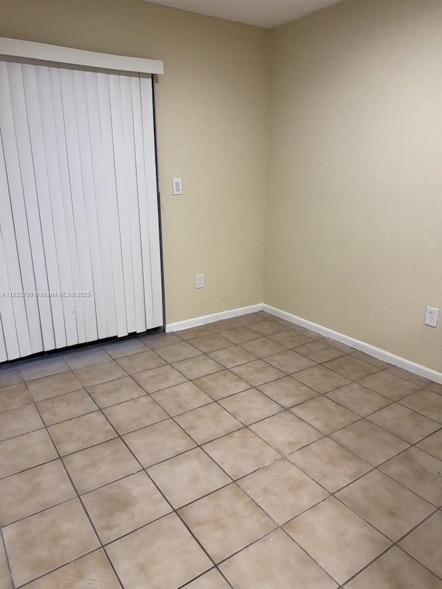 2341 W 66th Pl Unit 103, Hialeah, FL 33016 - empty room featuring baseboards
