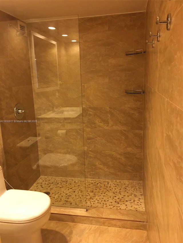 5700 Collins Ave Unit 6J, Miami Beach, FL 33140 - full bathroom with a walk in shower and toilet
