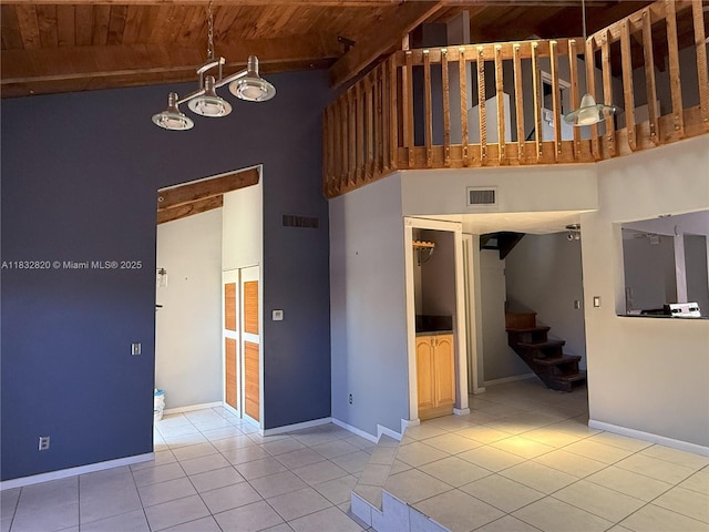 1965 SW 81st Way, Davie, FL 33324 - tiled empty room with wood ceiling, a high ceiling, and stairway