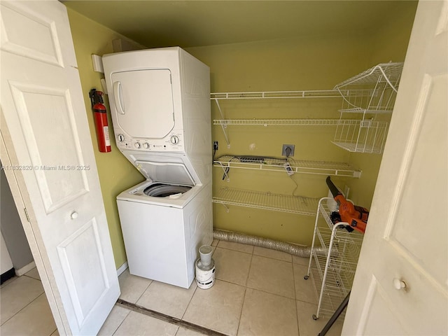 1965 SW 81st Way, Davie, FL 33324 - laundry area with stacked washer and clothes dryer and light tile patterned floors