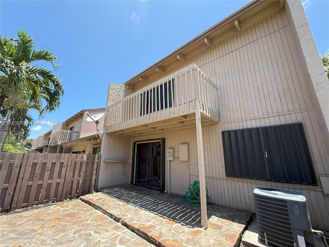 1965 SW 81st Way, Davie, FL 33324 - back of property featuring a balcony and a patio