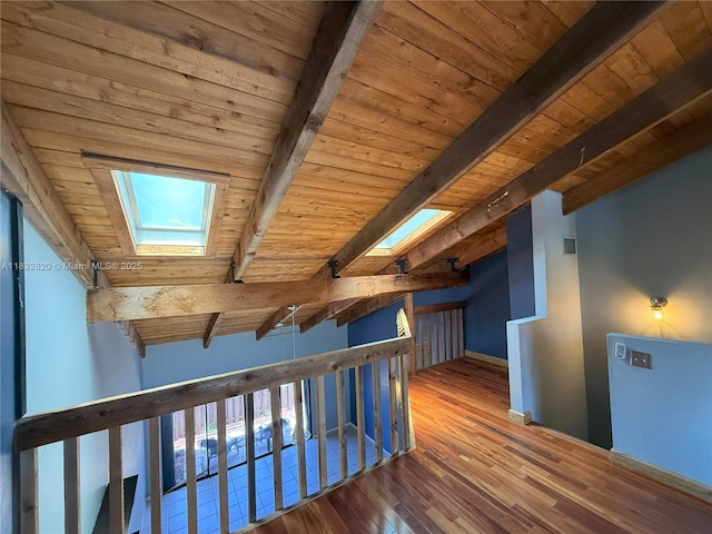 1965 SW 81st Way, Davie, FL 33324 - hall featuring a skylight, a wooden ceiling with exposed beams, wood finished floors, and an upstairs landing