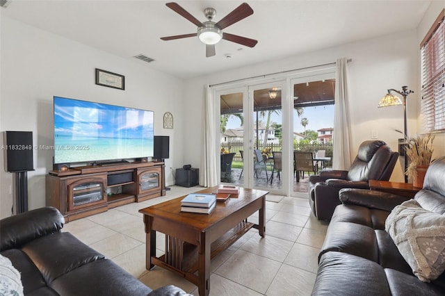 14842 SW 22nd Ter, Miami, FL 33185 - living area with light tile patterned flooring, ceiling fan, and healthy amount of natural light