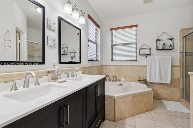 14842 SW 22nd Ter, Miami, FL 33185 - full bath with a garden tub, a shower stall, tile patterned flooring, and double vanity