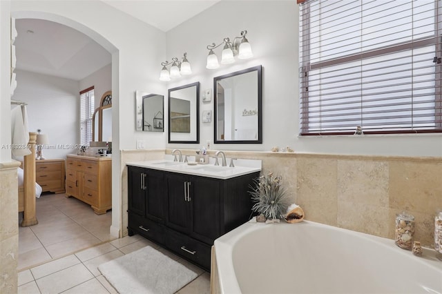 14842 SW 22nd Ter, Miami, FL 33185 - bathroom featuring double vanity, a garden tub, and tile patterned flooring
